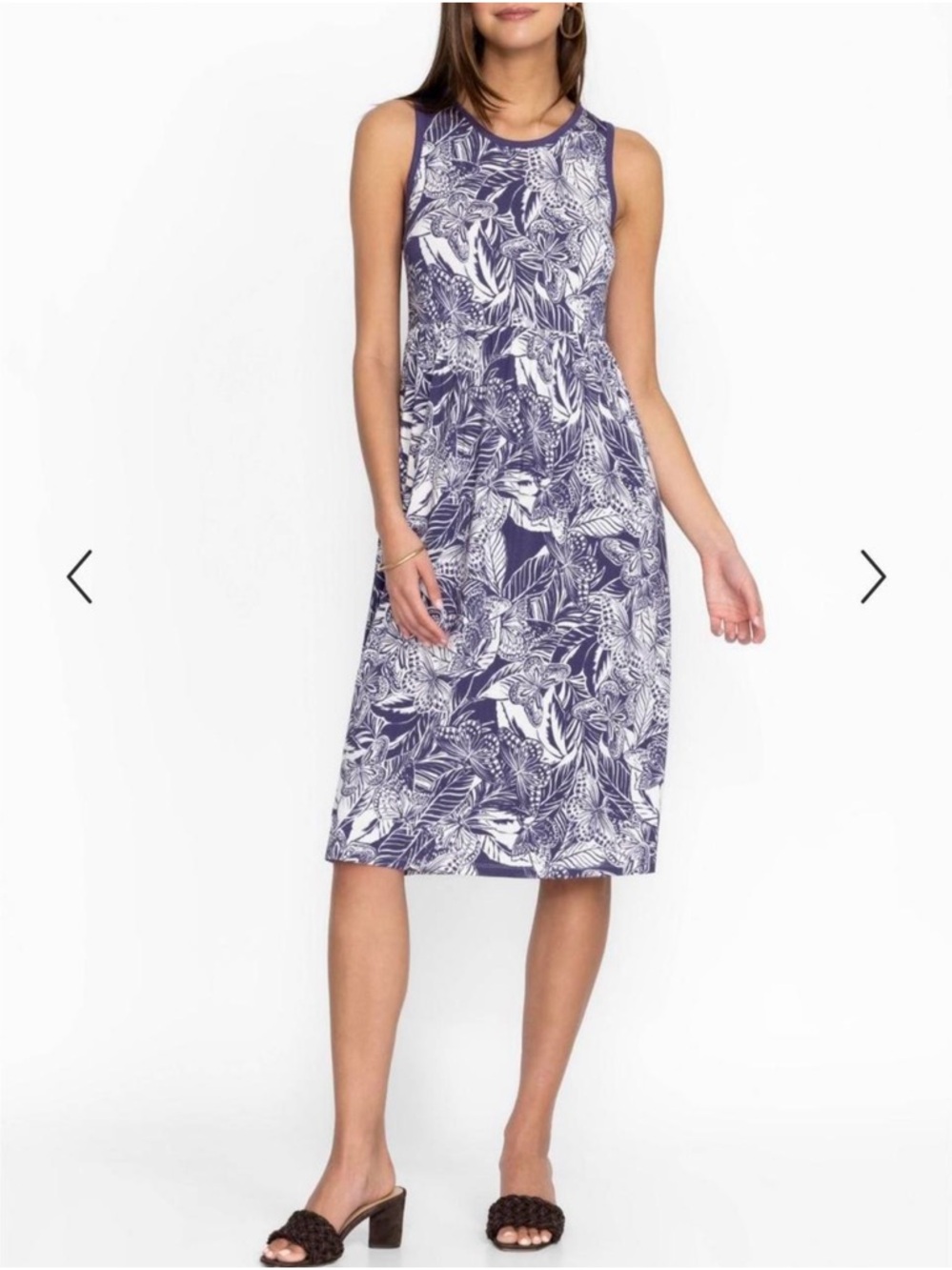 Johnny was Carioca easy fit tank dress in a beautiful purple butterfly pattern.